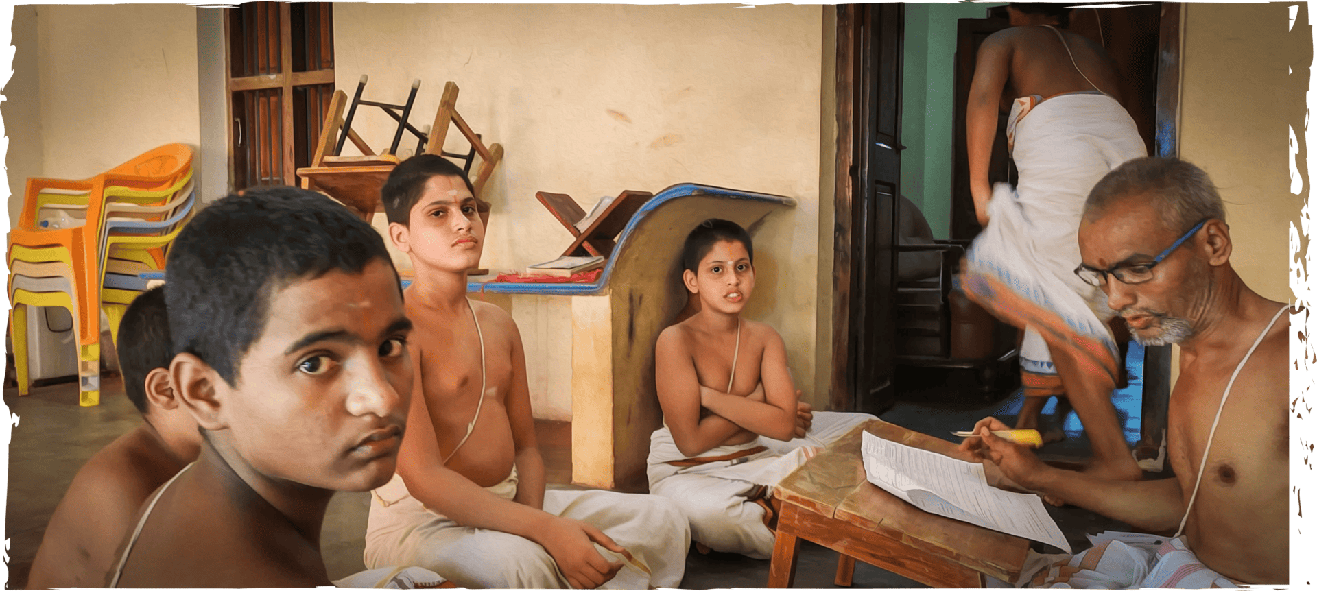 Image of Vedic students in their listening to their guru.
