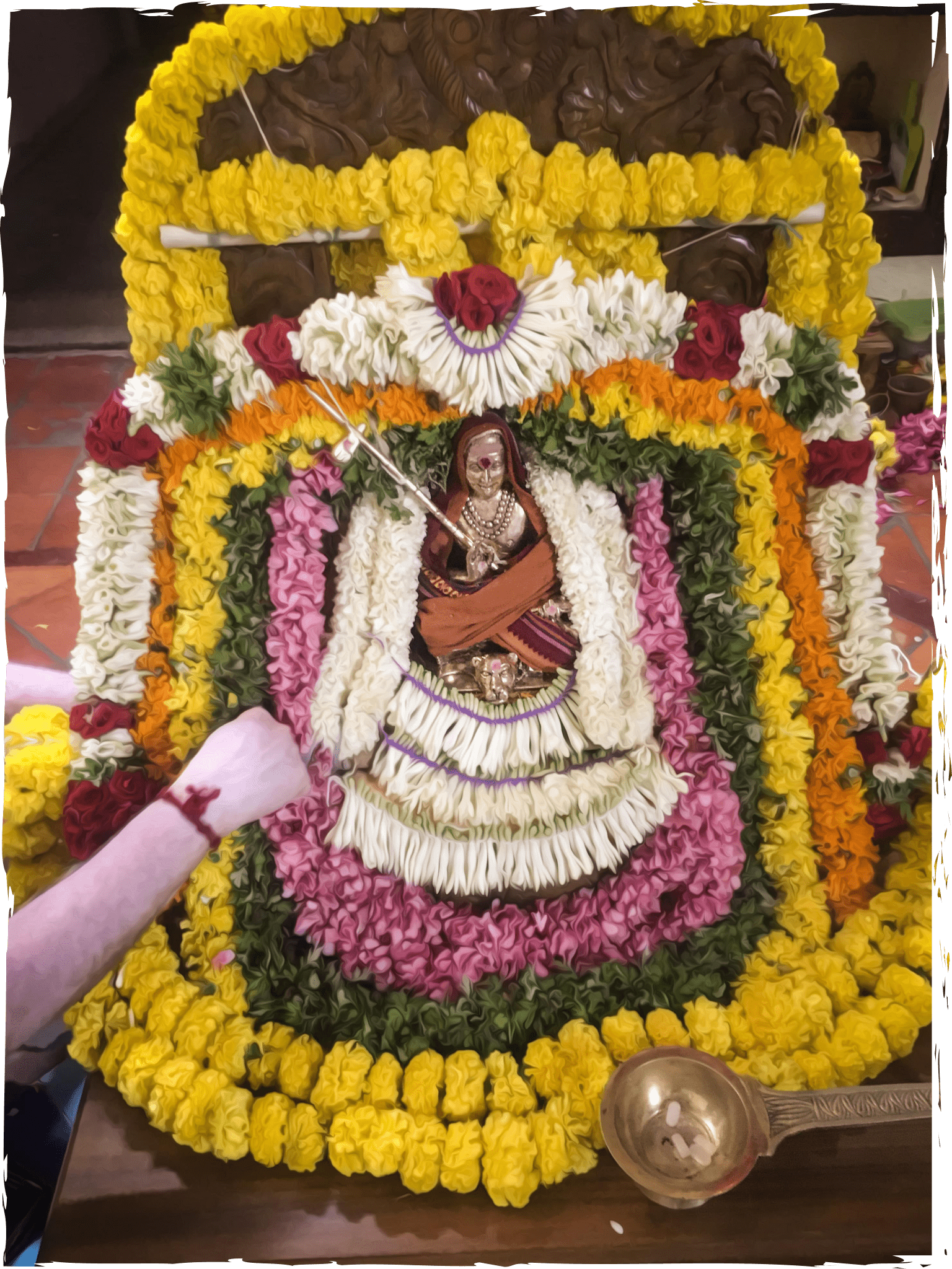A beautifully decorated deity ready for pooja.